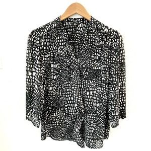 Milano Black and white patterned blouse with ruffle M